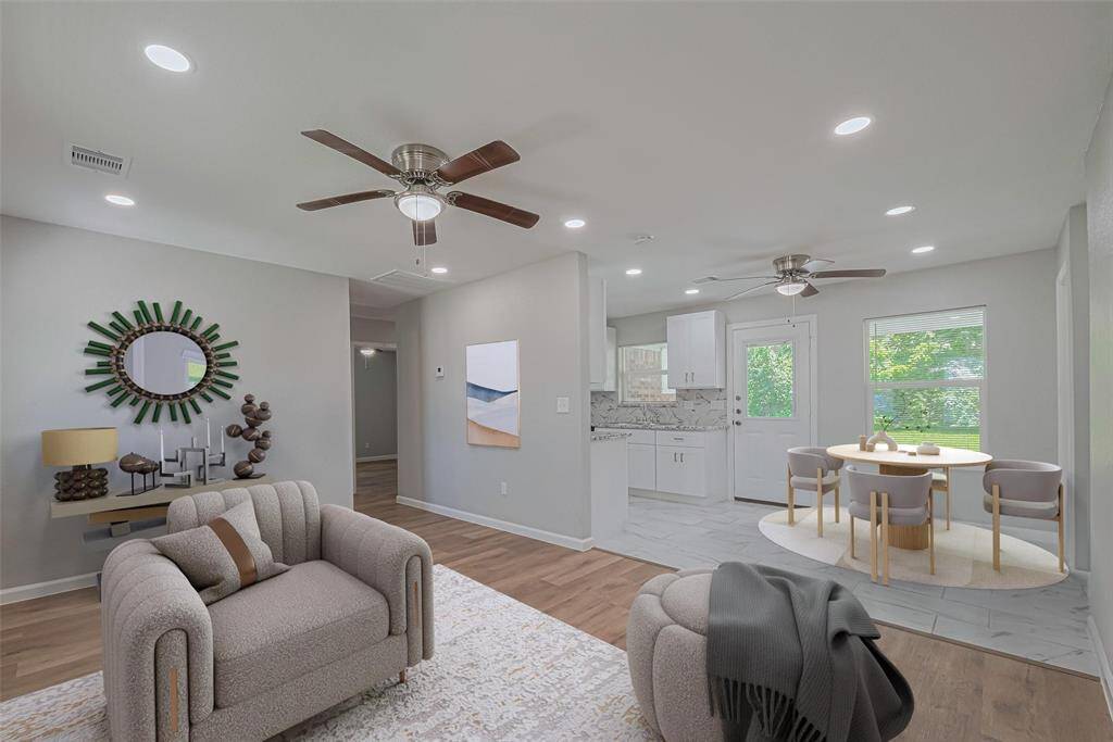 *virtually staged* perfect for entertaining, the breakfast area opens to the living room.