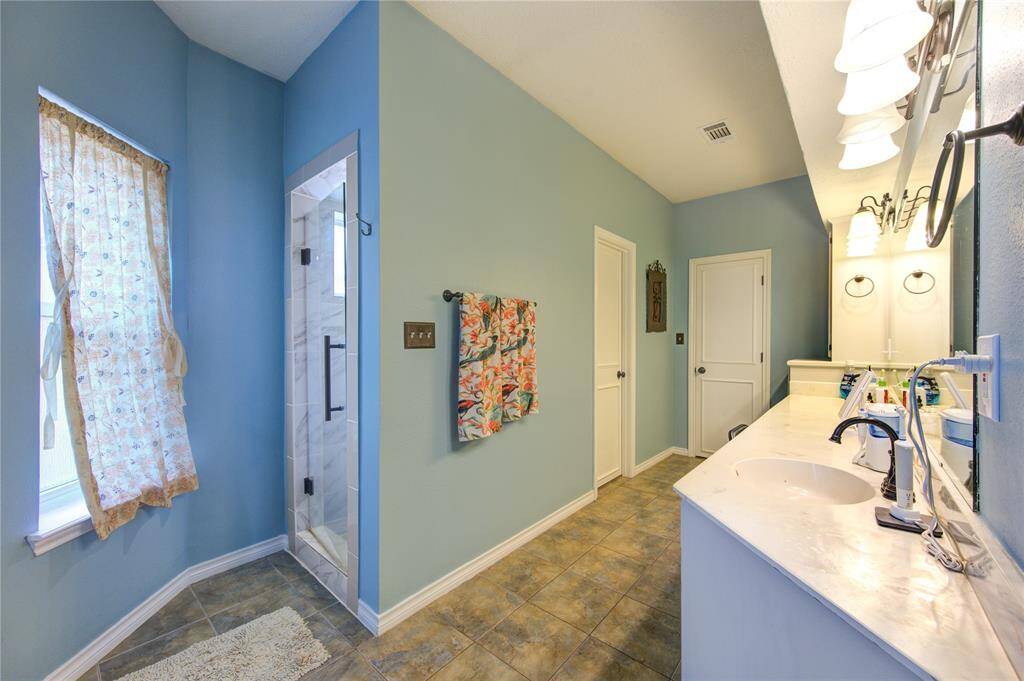 The Primary Bath also has a walk in shower which was recently updated.