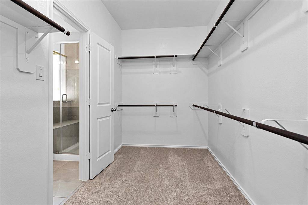 A spacious Primary walk-in closet completes this serene escape.