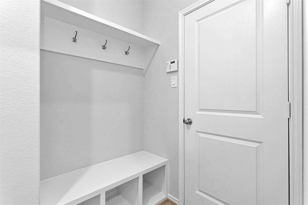 This home also boasts a convenient Mud Room with built-in storage!