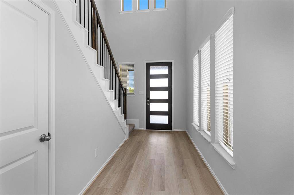 The stunning features of this home start from the moment you step inside the upgraded 8-ft Front Door with Contemporary door lites, Mahogany Stain and door handle with Satin Nickel finish!