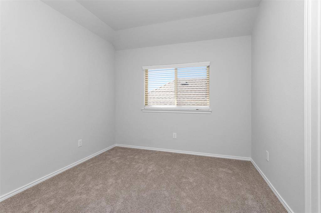 Bedroom #3 features upgraded carpet and neutral paint.