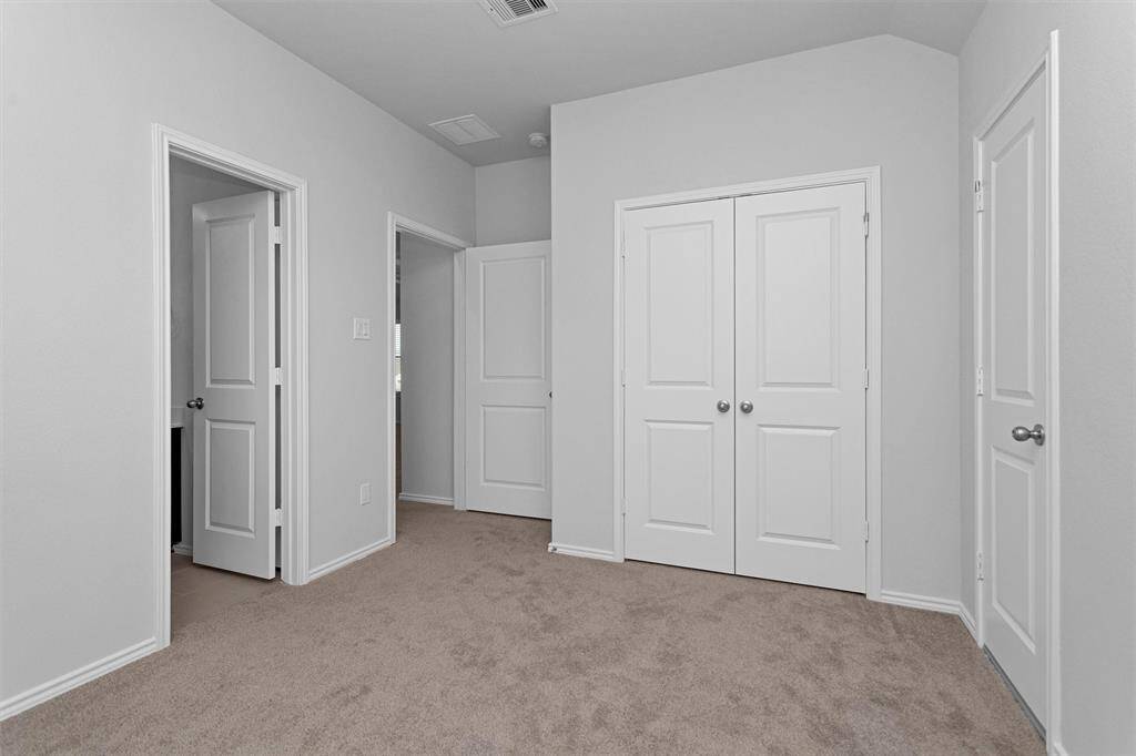 Bedroom #3 also features a closet and en-suite bath!