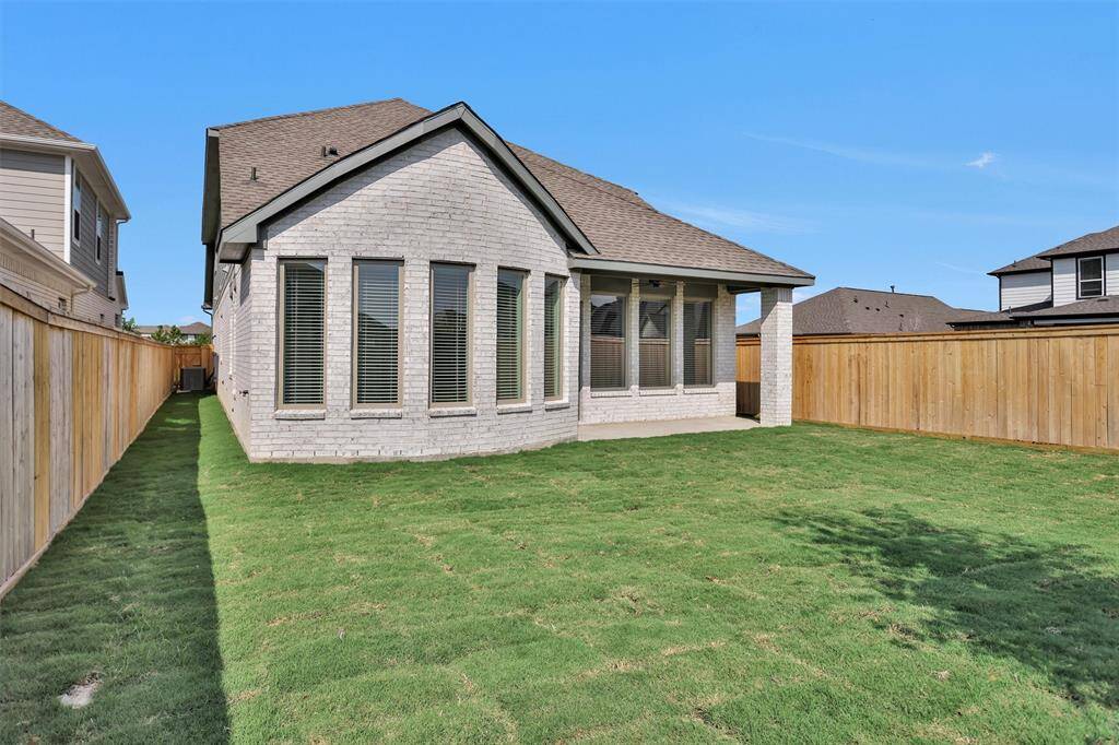 The back of the home is lined with windows, filling the home with natural light!