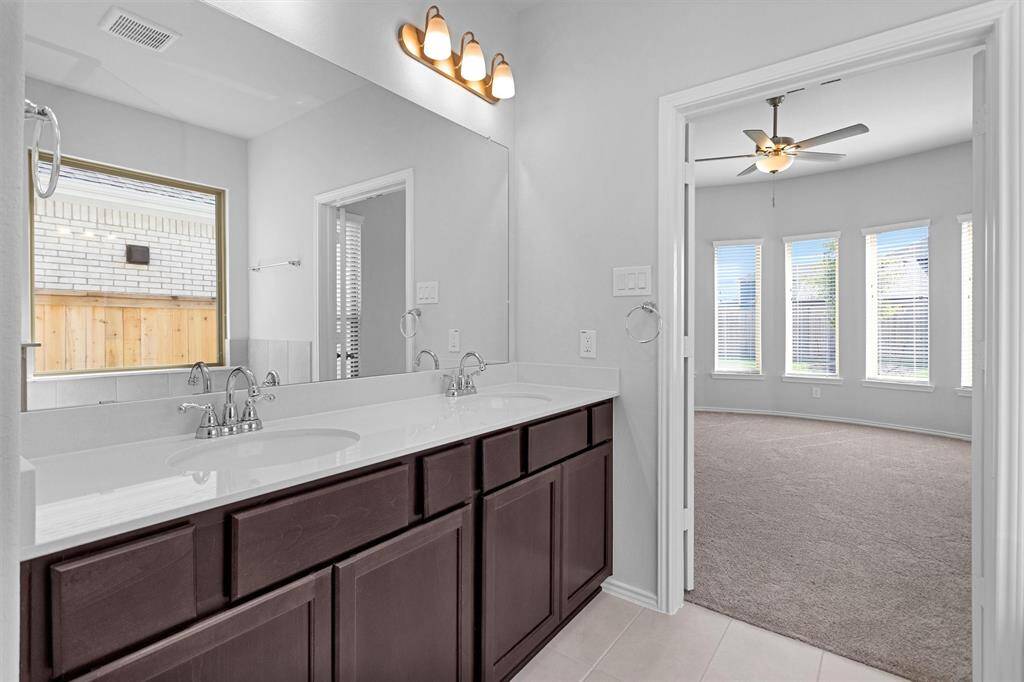 The Primary Suite features a full en-suite bath.
