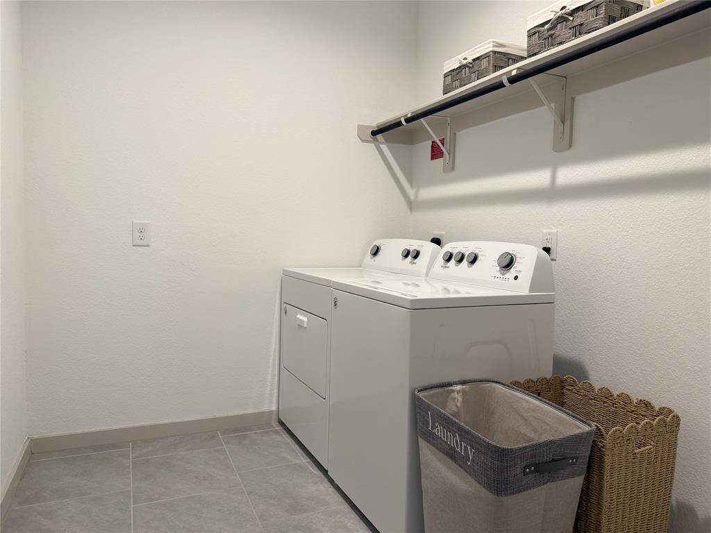Convenient guest half bath for added privacy.
