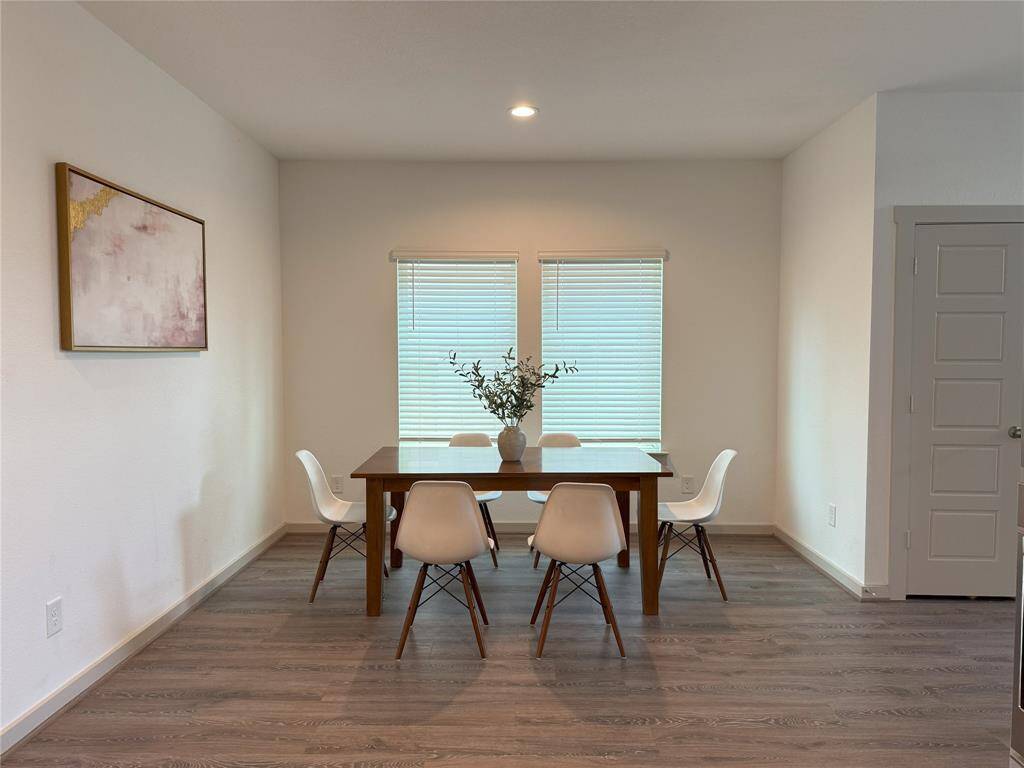 Spacious kitchen island doubles as a convenient breakfast table.