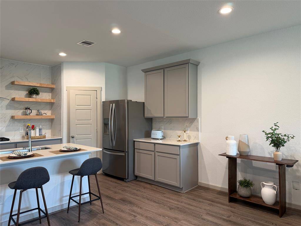 Ideal for entertaining, this formal dining area offers a welcoming ambiance.