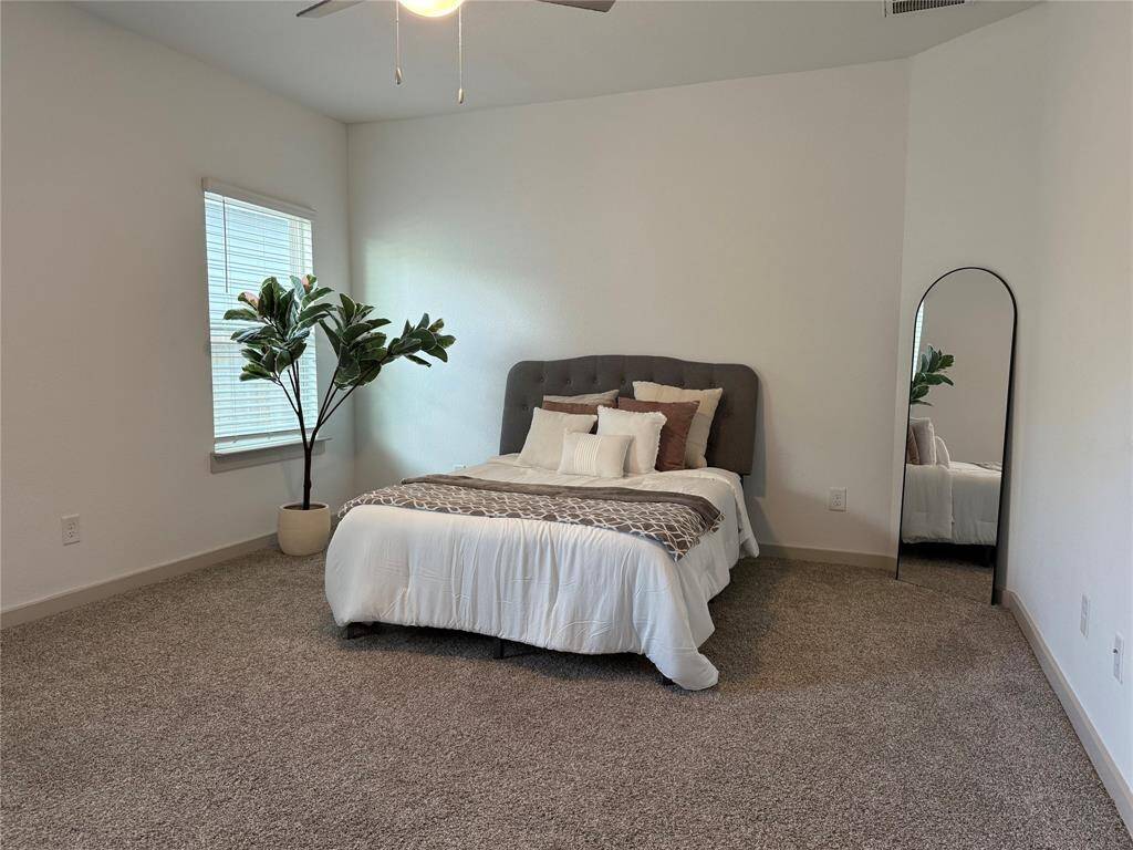 Experience seamless open-concept kitchen effortlessly flowing into the inviting living area.