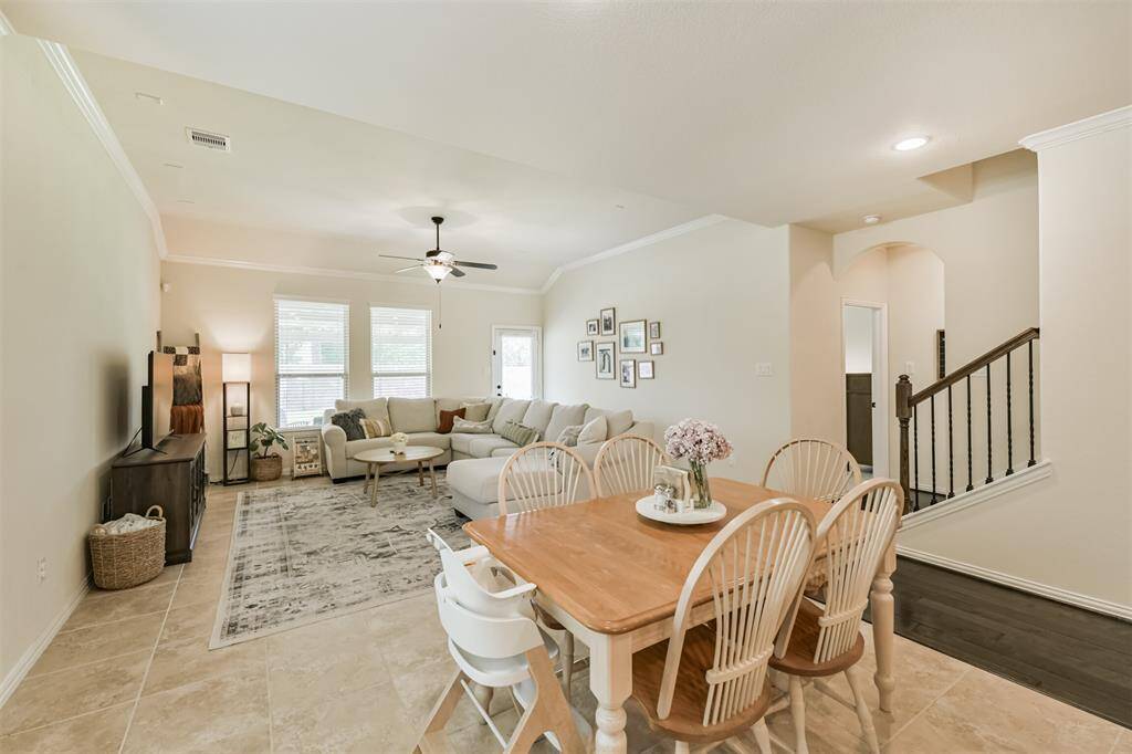 Breakfast area leads into den.