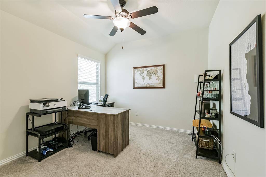 One of three secondary bedrooms on second floor currently being utilized as an office.