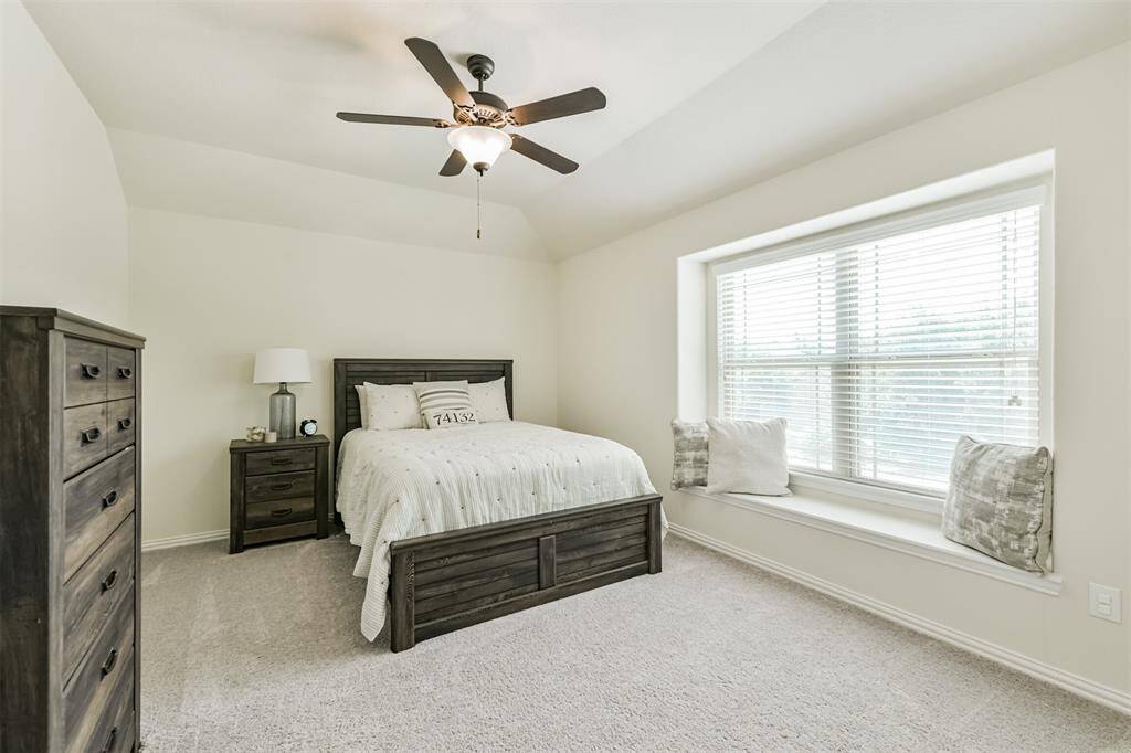 Three of three secondary bedrooms on second floor. SPACIOUS! Note the windowseat.