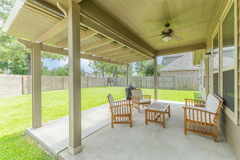 Fabulous extended covered patio gives you additional outdoor living space.