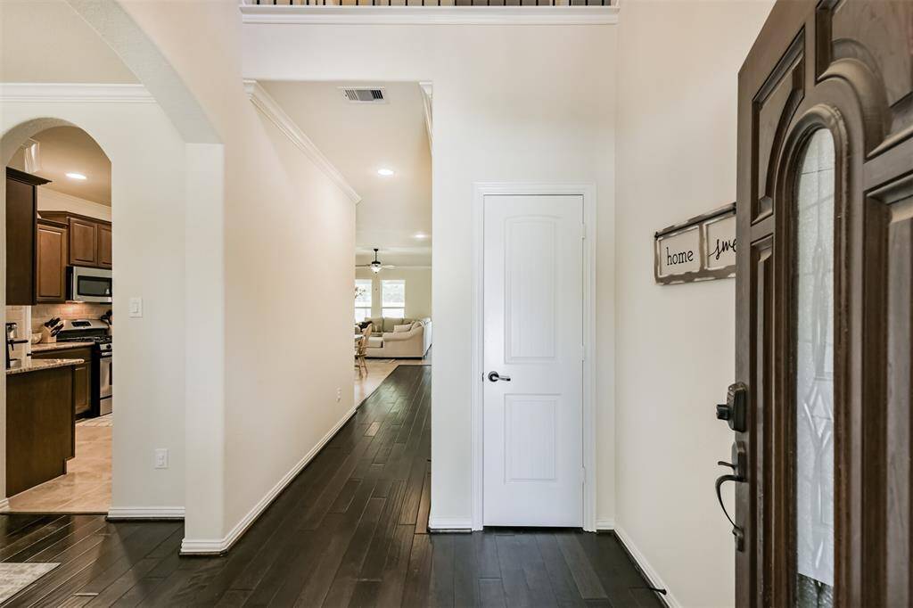 Two story entryway greets you as you enter the home.