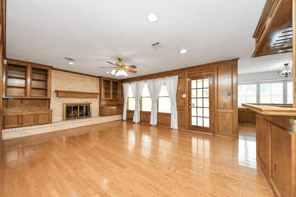 Open living area overlooking large private backyard.