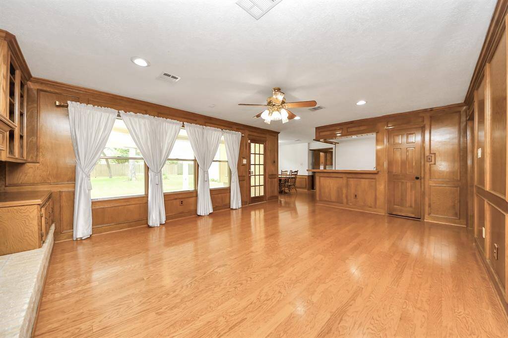 Living room is open to breakfast room and wet bar