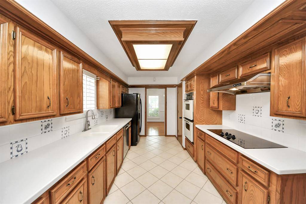 Large kitchen with custom cabinets