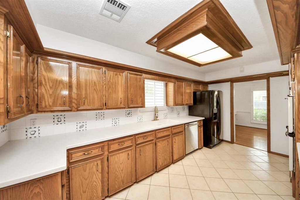 Window overlooks private driveway.