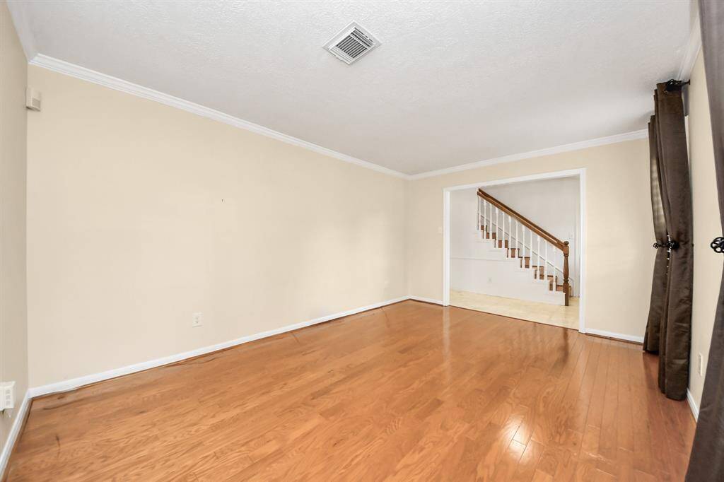 Large flex room at the front of the home is a great space for an office/playroom/ extra sitting.