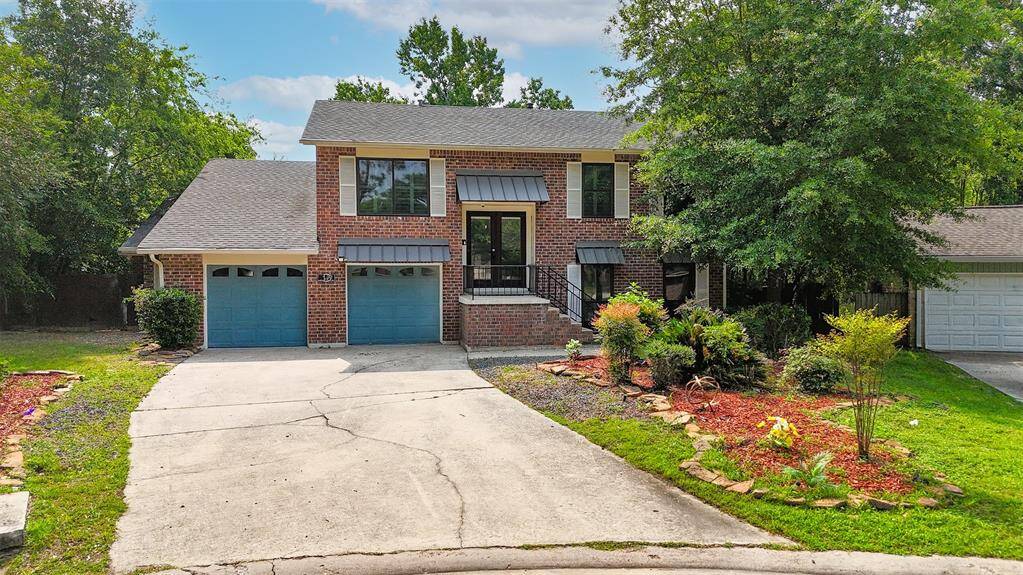 A closer look reveals the home’s distinctive landscaping and generous double-wide driveway, offering both charm and functionality. The setting feels peaceful and private—a rare find with plenty of curb appeal.