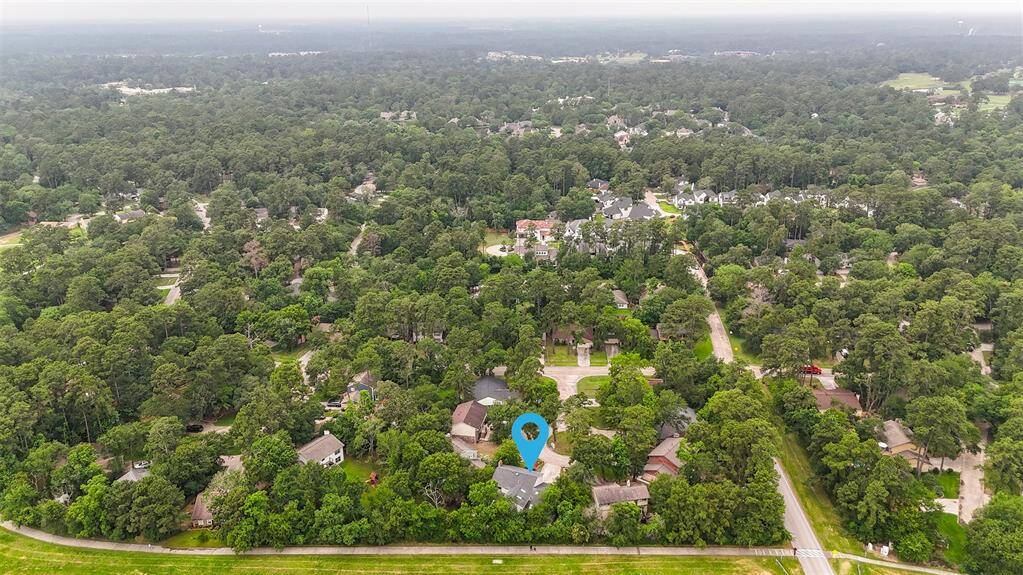 Tucked away on a peaceful cul-de-sac in the Village of Grogan’s Mill, this home offers a rare sense of privacy in the heart of The Woodlands. Enjoy the serenity of a quiet street with the convenience of nearby amenities just minutes away.