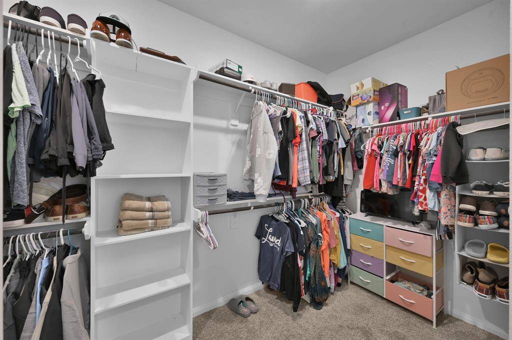 Huge walk-in closet in the primary bedroom