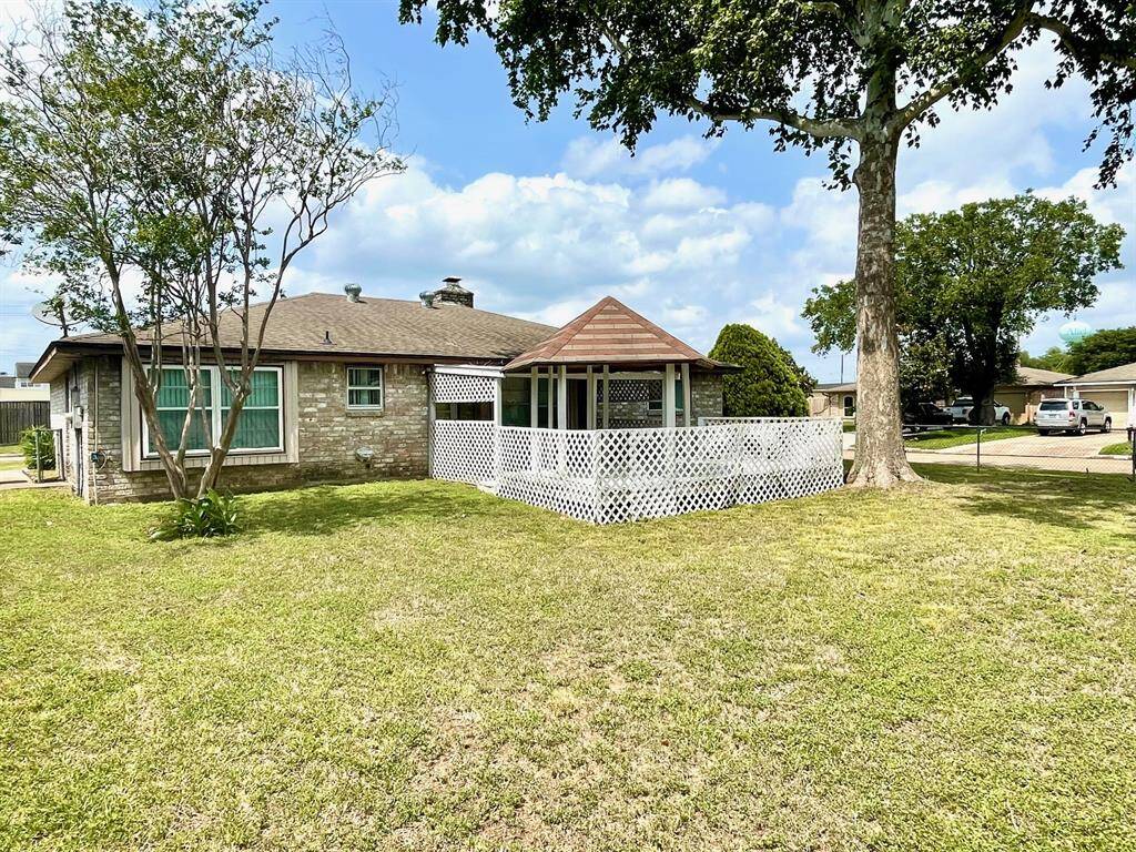 Wonderful backyard includes a pergola and covered patio!