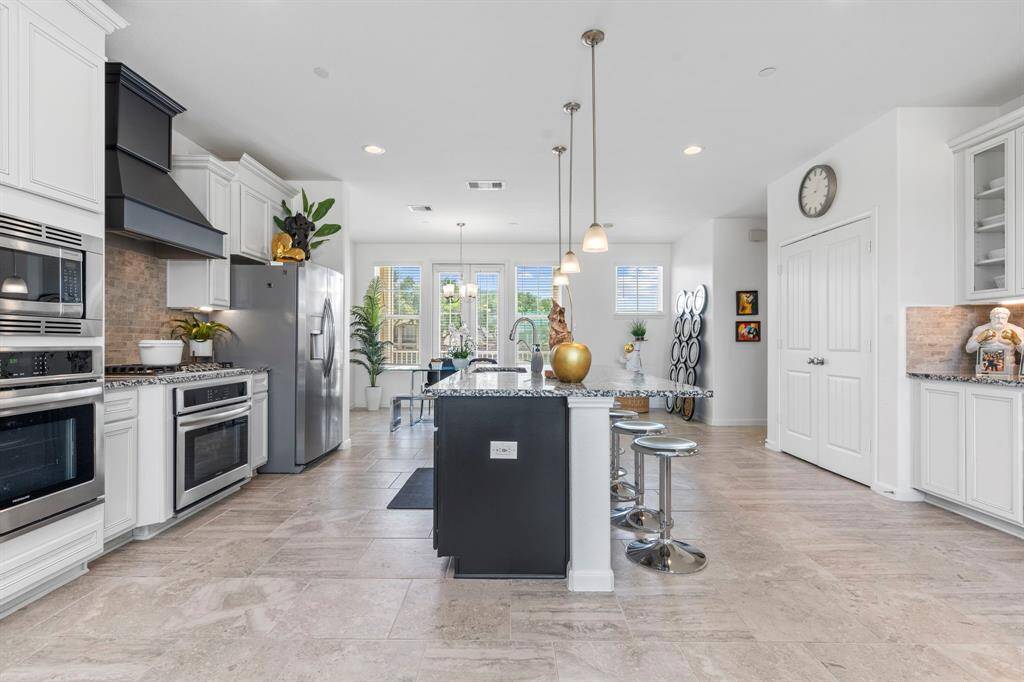 Enjoy a seamless connection between the kitchen and living areas. Whether you’re entertaining or cooking for the family, you’ll always feel part of the action with this open, inviting layout.