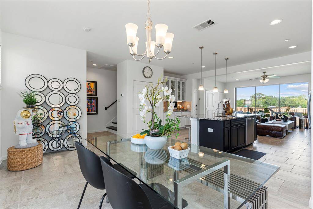 The spacious primary bedroom offers room for a king-sized bed and cozy seating area. Direct access to the private balcony creates a seamless indoor-outdoor feel you’ll love waking up to.