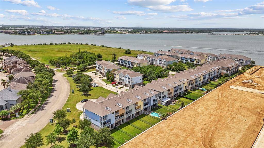 Colorful, coastal architecture meets modern convenience in these three-story townhomes. Each features private balconies, fresh landscaping, and an oversized 3 car garage—style meets functionality just minutes from the coast. Low tax rate and no flooding during any of the storms.