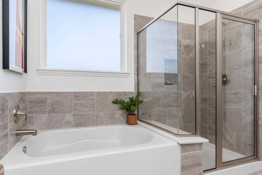 Bright and spacious upstairs hallway with recessed lighting and clean lines. Provides easy access to secondary bedrooms, bathrooms, and laundry, with modern finishes throughout. No carpet in this amazing home!