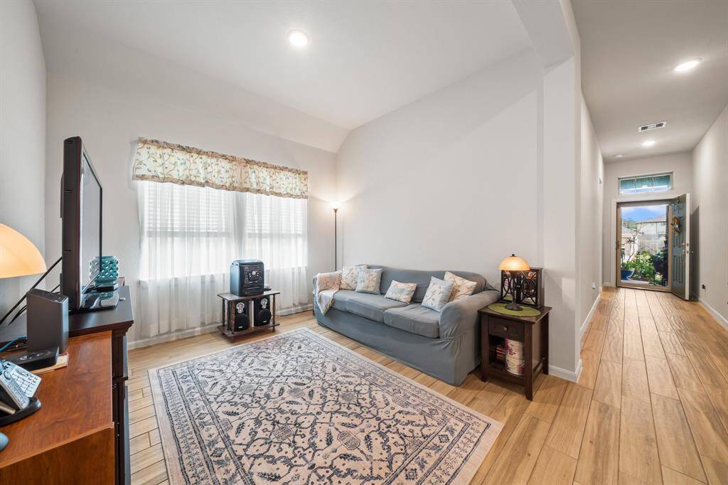 Open space with flexible uses.  Currently, it is being used as an extra sitting room / living room space.