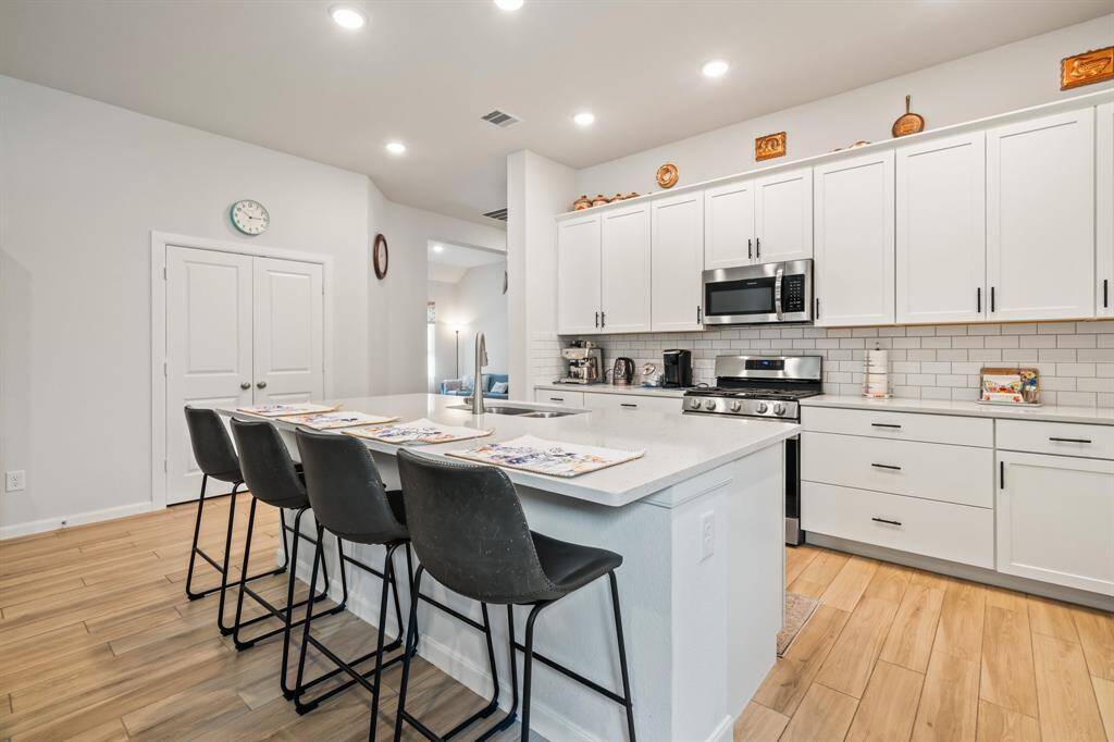 Opposite view of the spacious kitchen.
