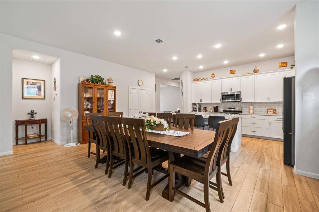 Large dining area open to the kitchen.