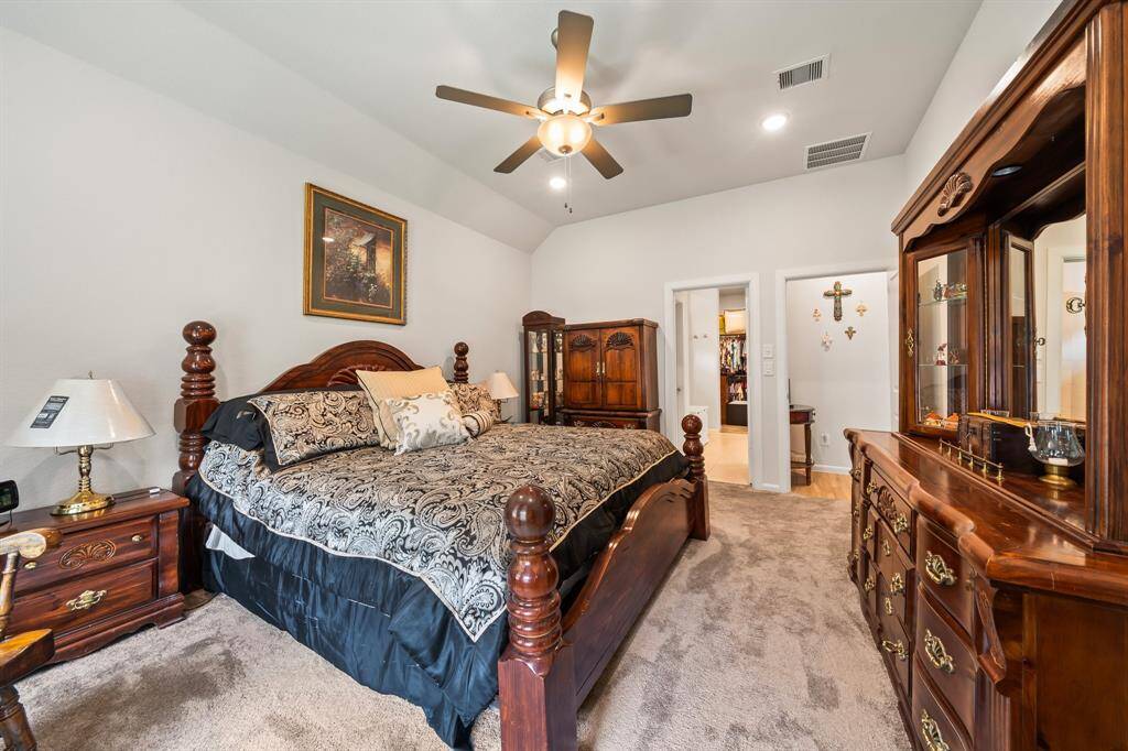 Primary bedroom is located in the back of the home off the main family room.