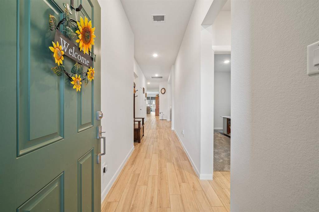 Following the layout of the home from the inviting front entry.