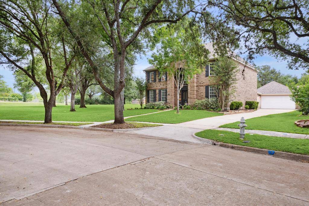 Spacious 2 story home situated at the end of the block next to a serene green space.