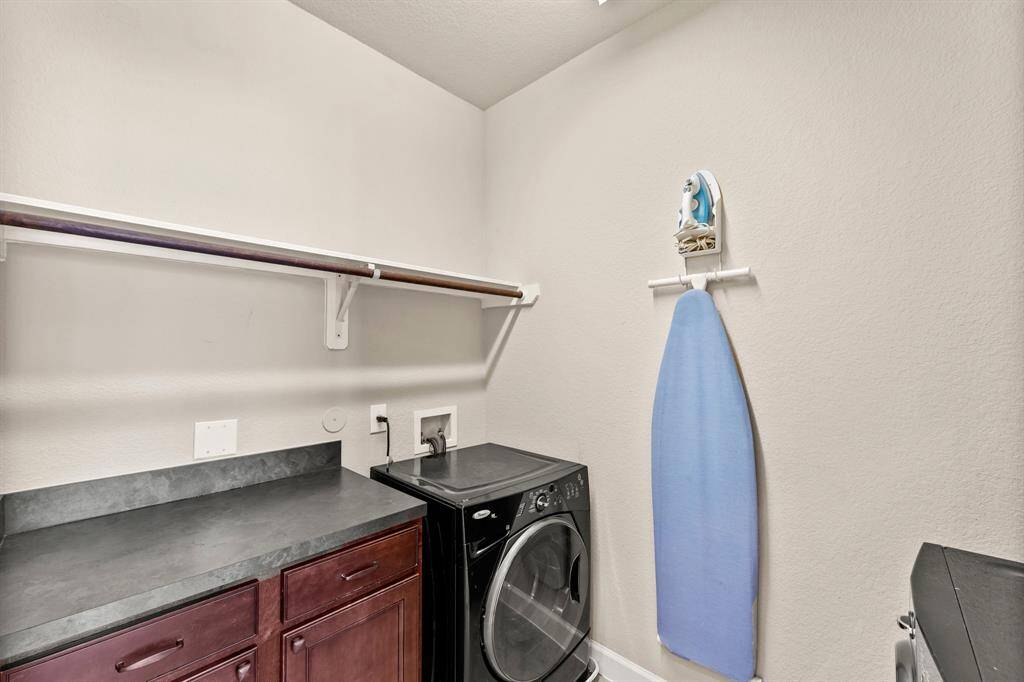 Laundry room conveniently located next to Primary Bedroom