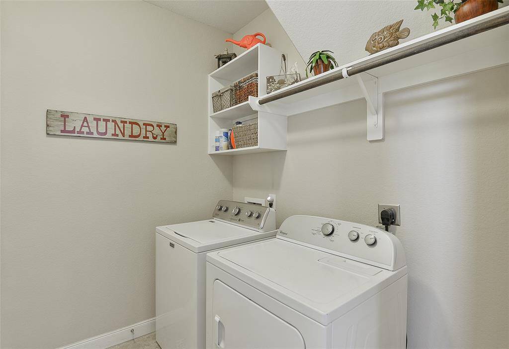 The laundry room is conveniently located on the first floor and offers a modest yet functional space—perfect for handling daily chores with ease and efficiency.