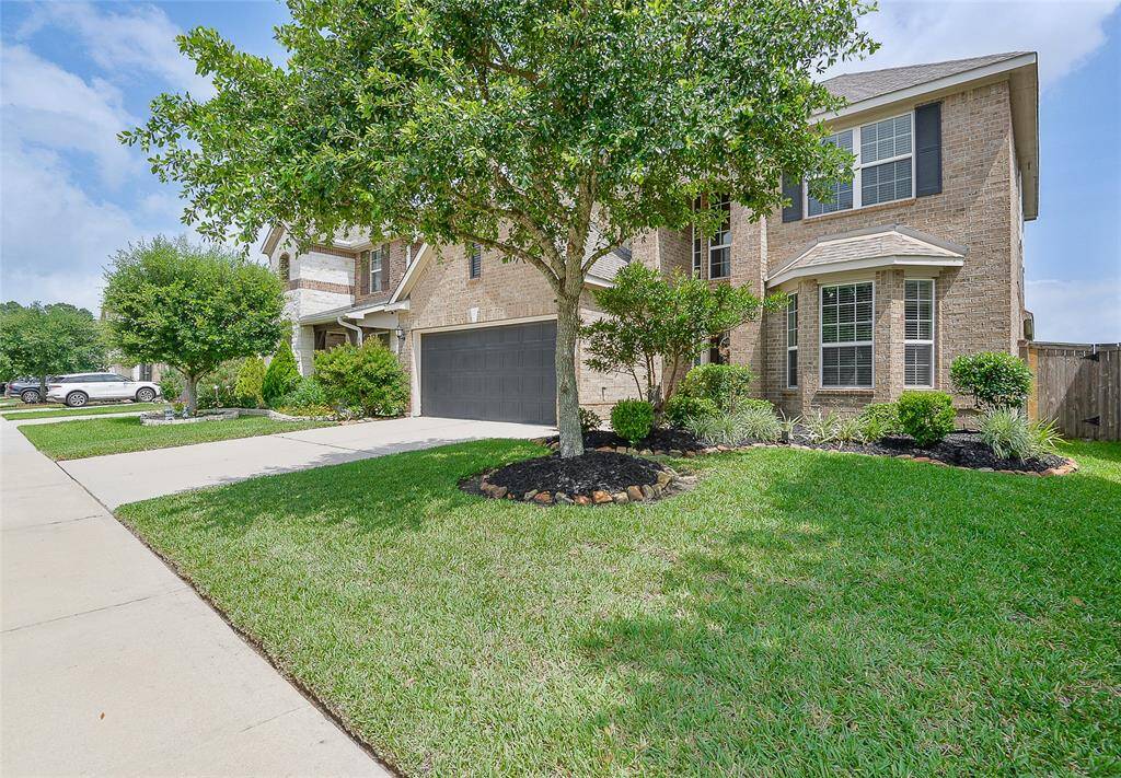 The home has been power washed, spruced landscape.