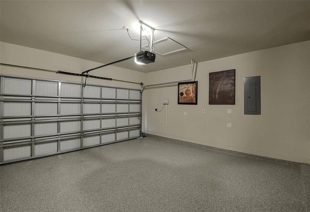 The clean epoxy flooring offers a sleek, durable, and low-maintenance finish.