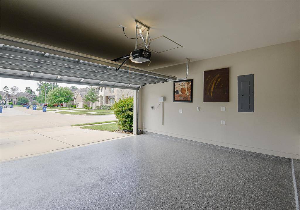 Neat garage, garage door opener.