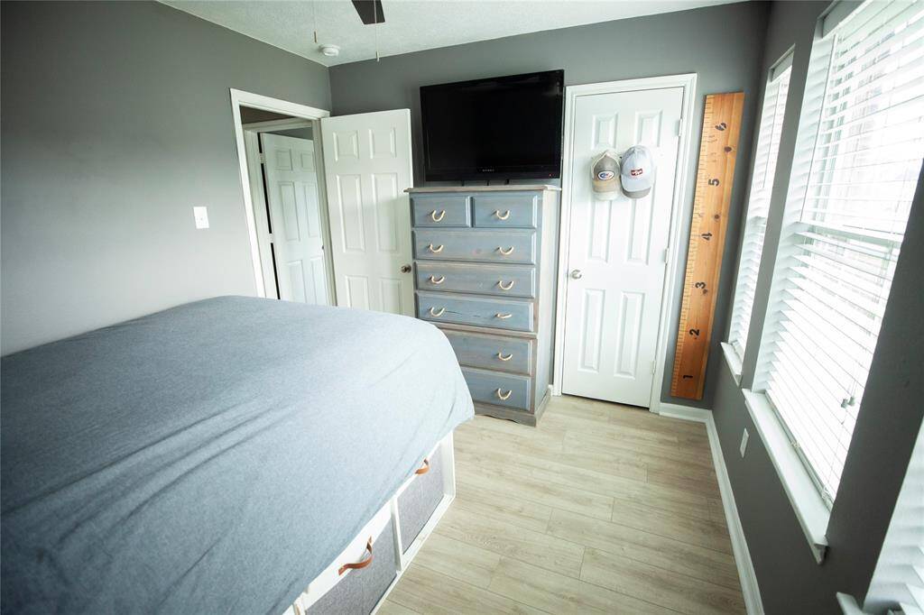 The space is both functional and inviting, with natural light pouring in through double windows.
