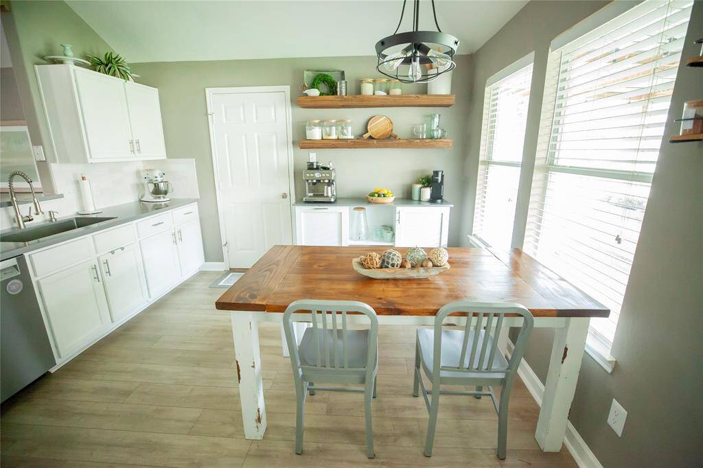 Open shelving adds a decorative touch while offering easy access to essentials.