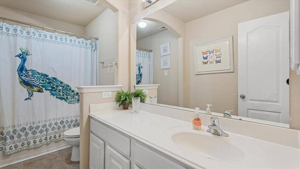 Full bathroom upstairs, tub/shower combo