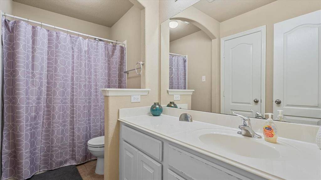 Full bathroom with large linen closet