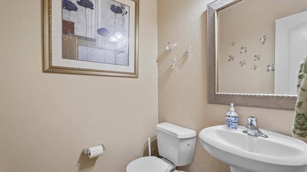 Half bath in the hallway