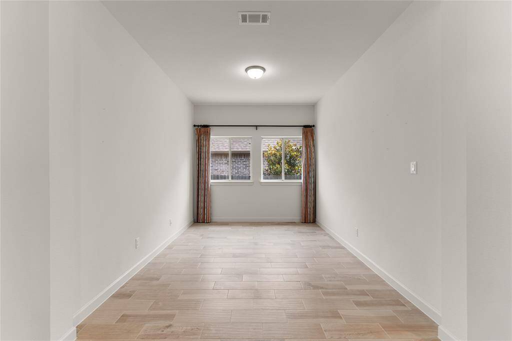 Formal dining room at the front of the home—perfect as a home office or flex space.