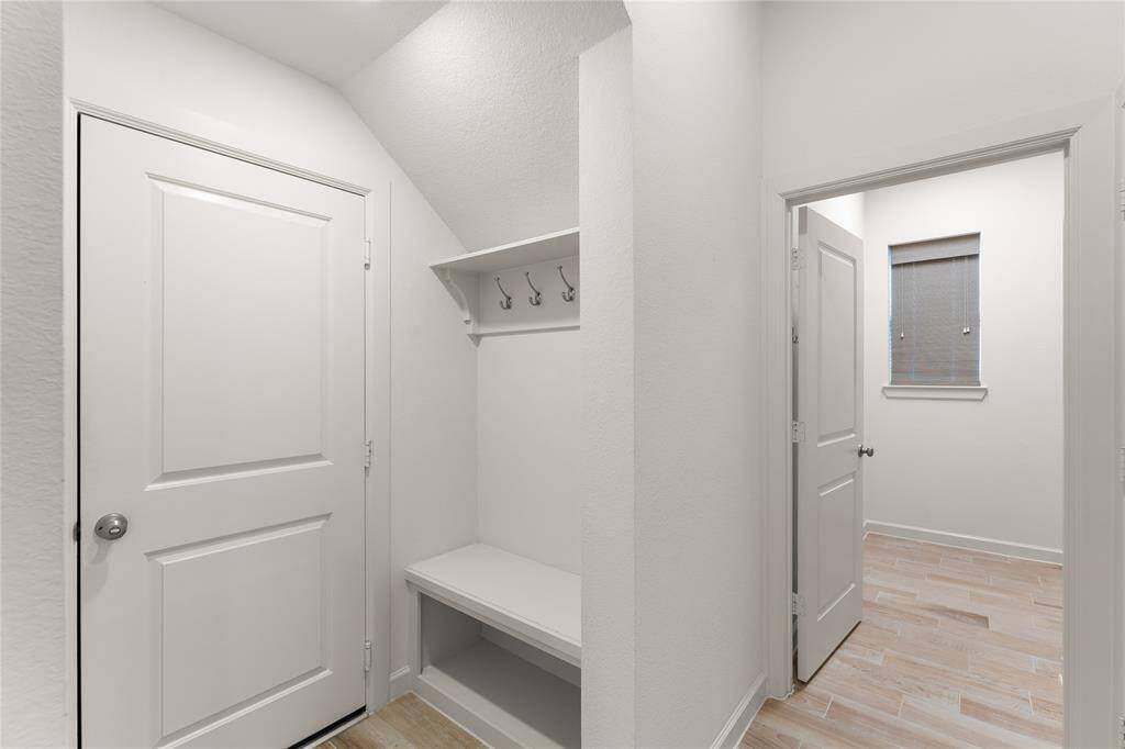 Great mud nook. Attic access from the garage—ideal for storing seasonal items.