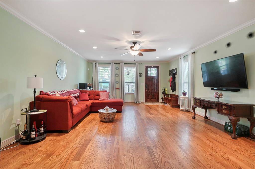 Living Room- Upon entering you are greeted by the spacious open living room with wood flooring